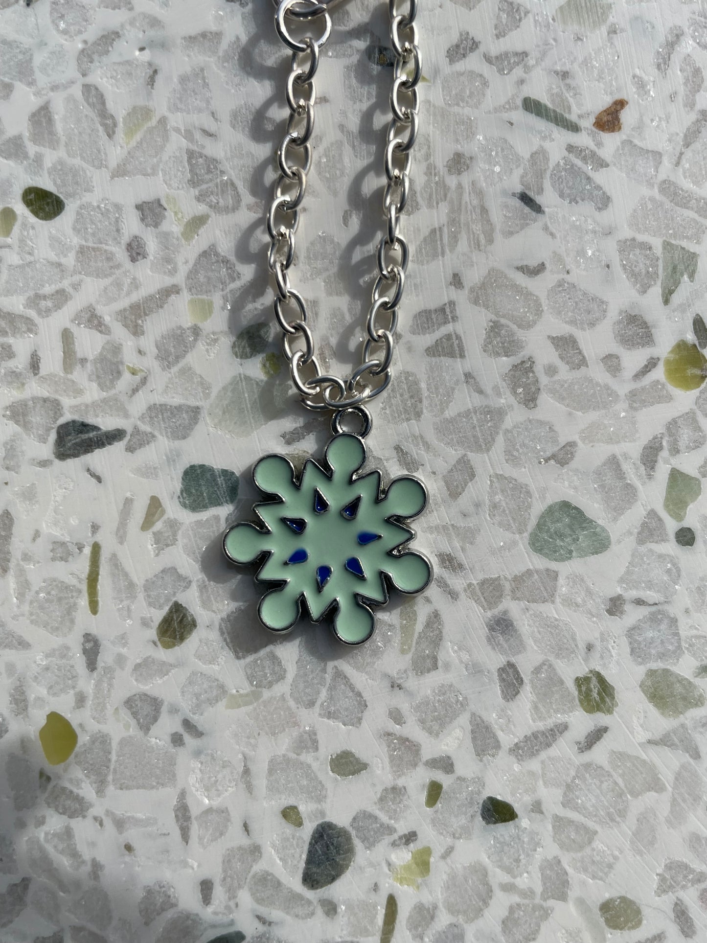 Teal snowflake (silver)