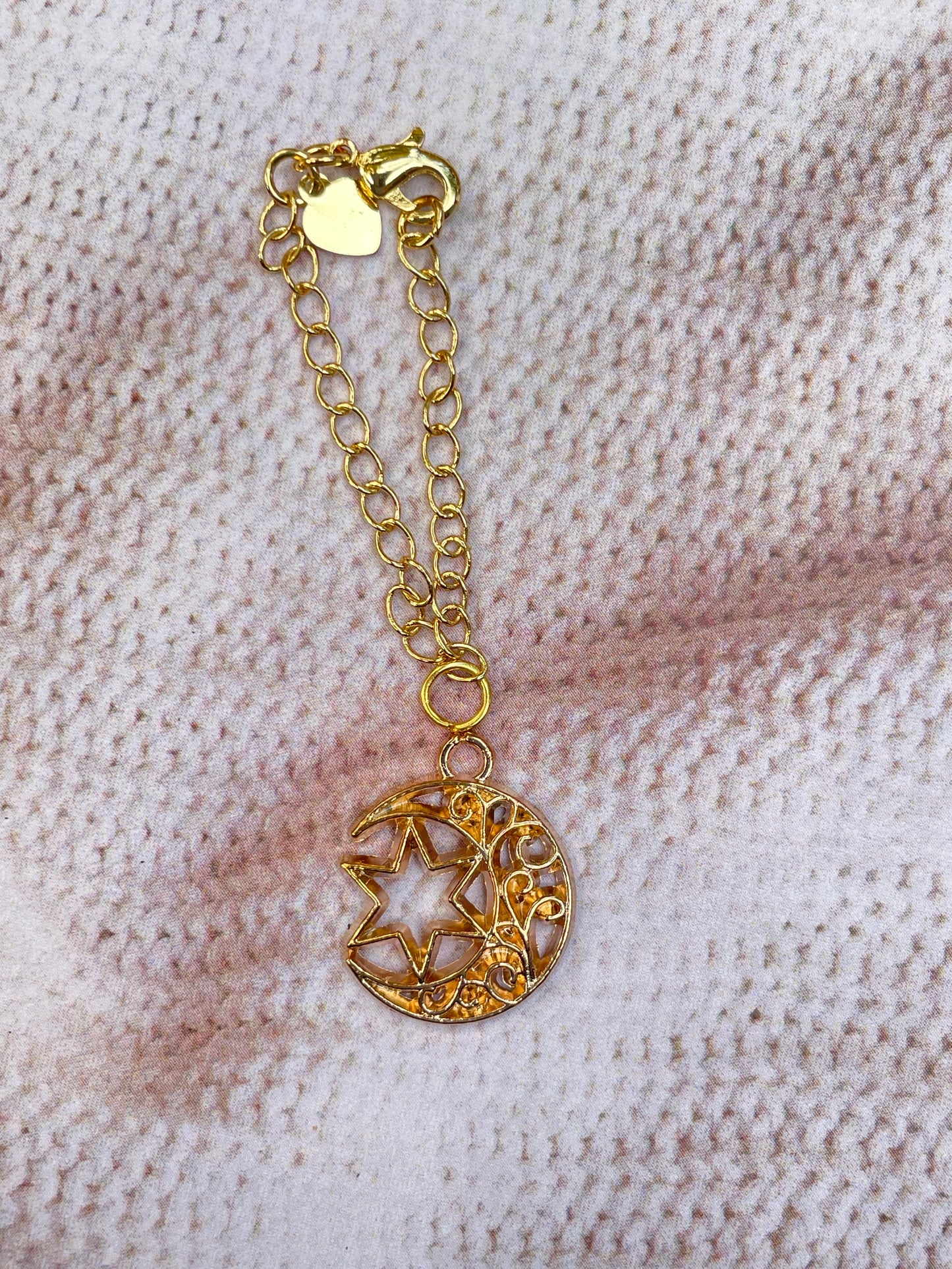 Gold crescent moon with star