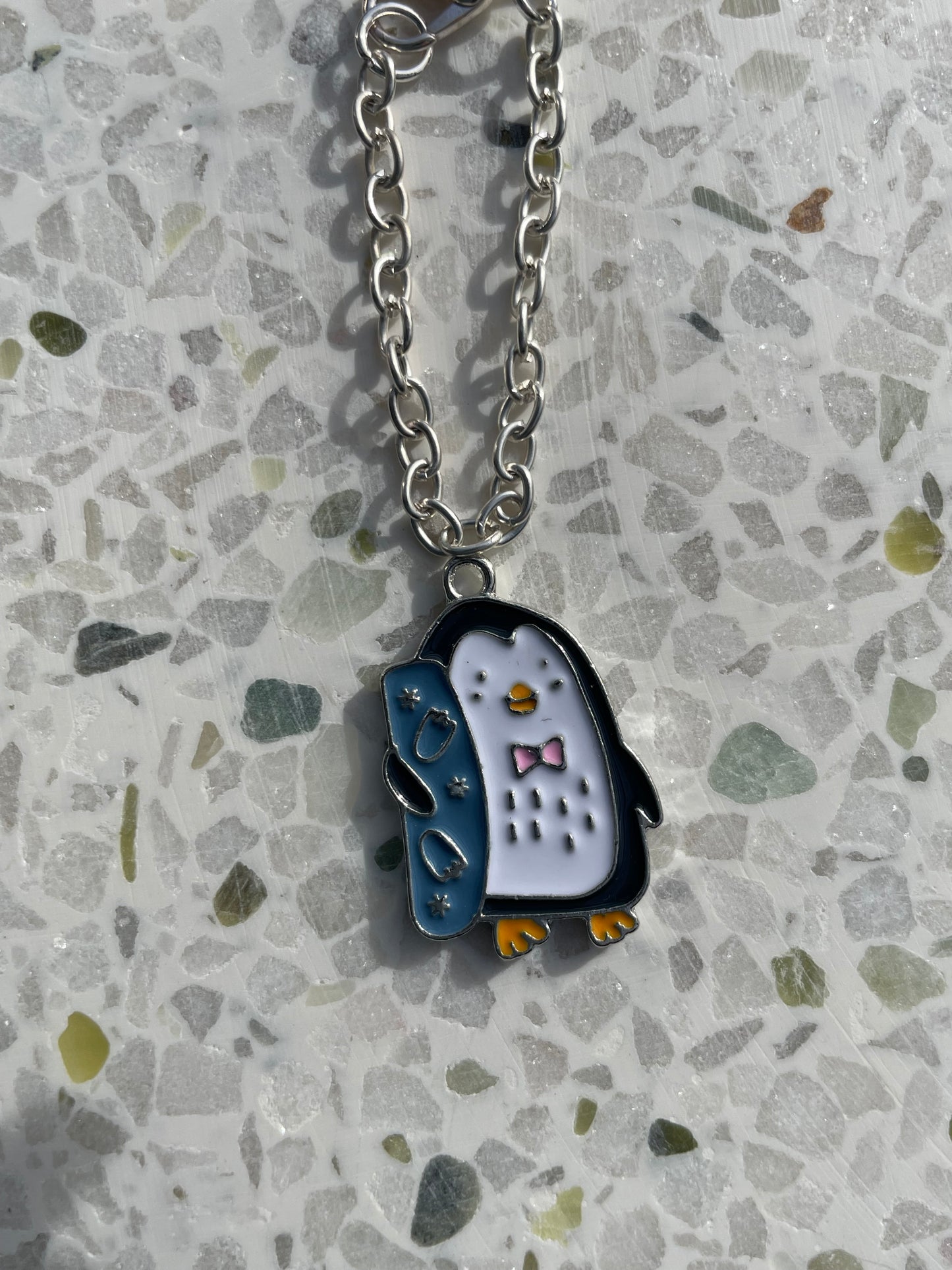 Snowboarding penguin